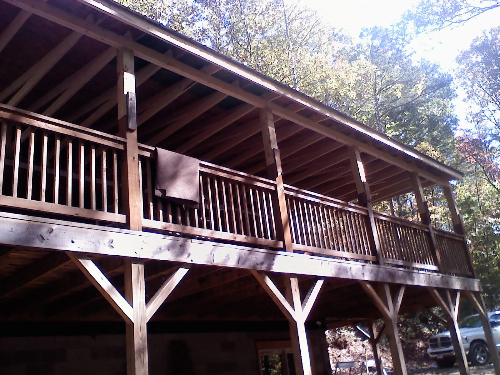 Timber framing under a new elevated porch and deck — Roof Leak Repair in Des Moines by Roofing Brothers